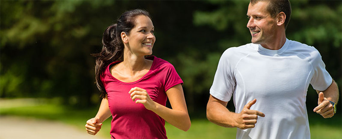 Couple jogging together to get healthy in Encinitas